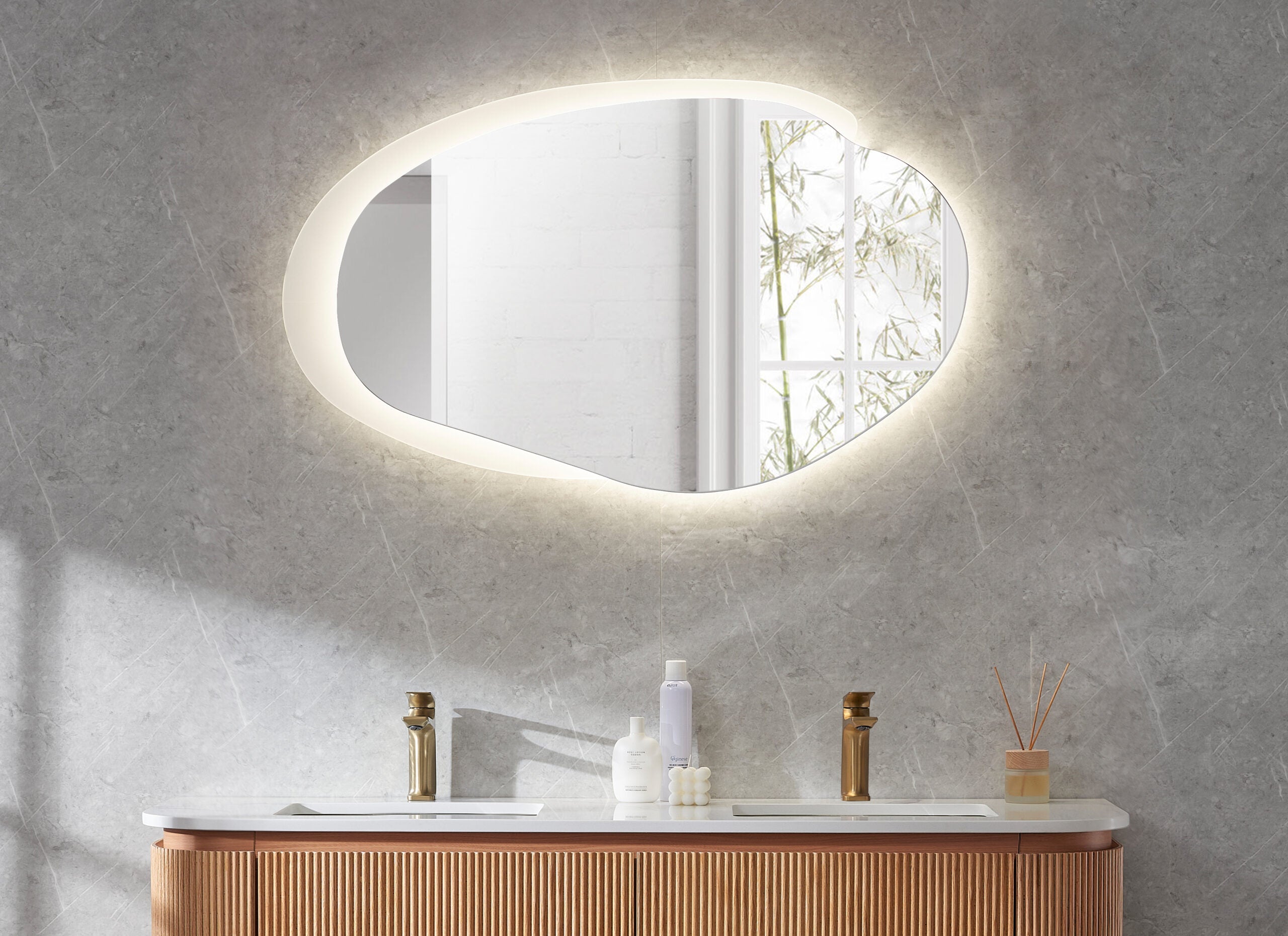 Bathroom vanity with a round LED mirror installed in Berwick bathroom