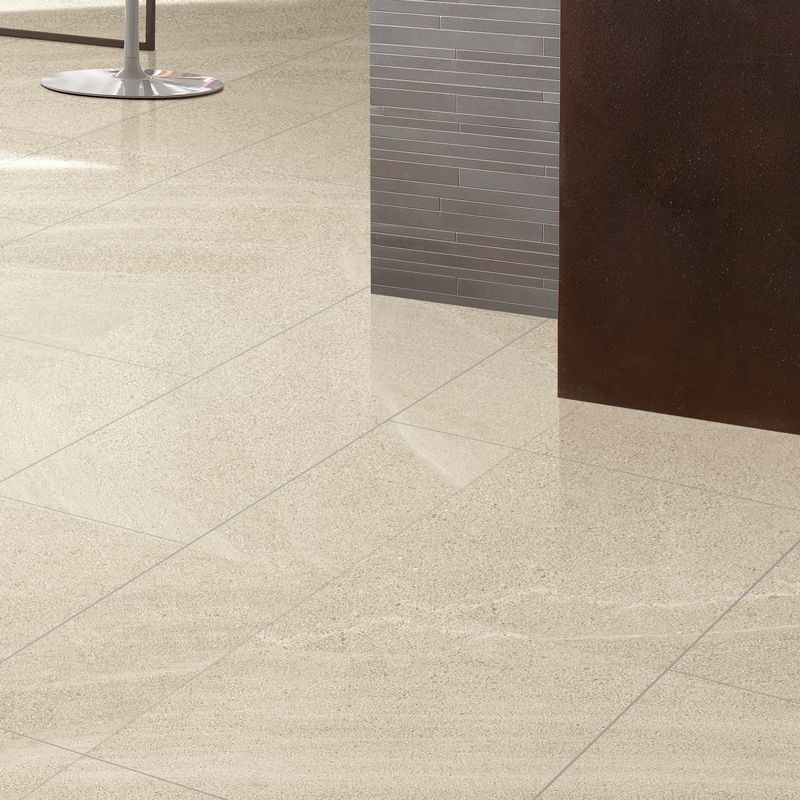 Limestone beige tile, 600x600x9 dimensions, adds timeless elegance to any space